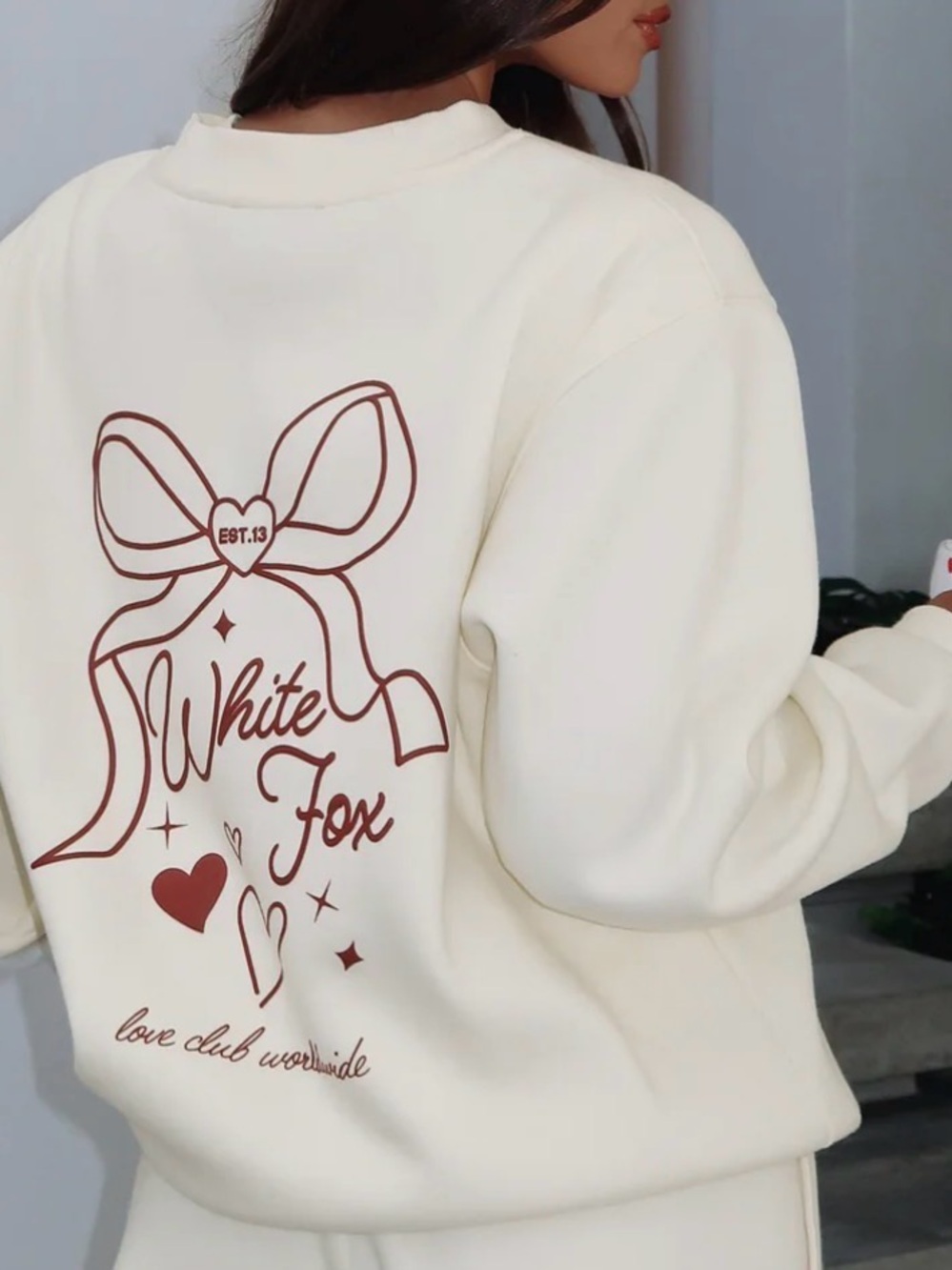 White Fox Boutique Cream Sweatshirt with Red Graphic